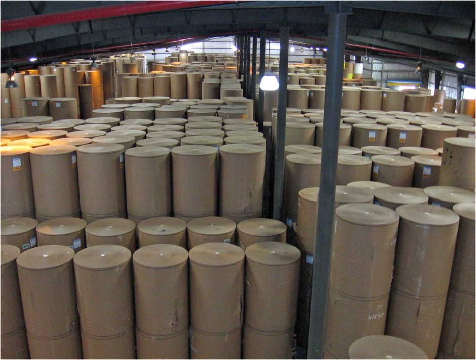 PAPER ROLLS IN WAREHOUSE OVERHEAD