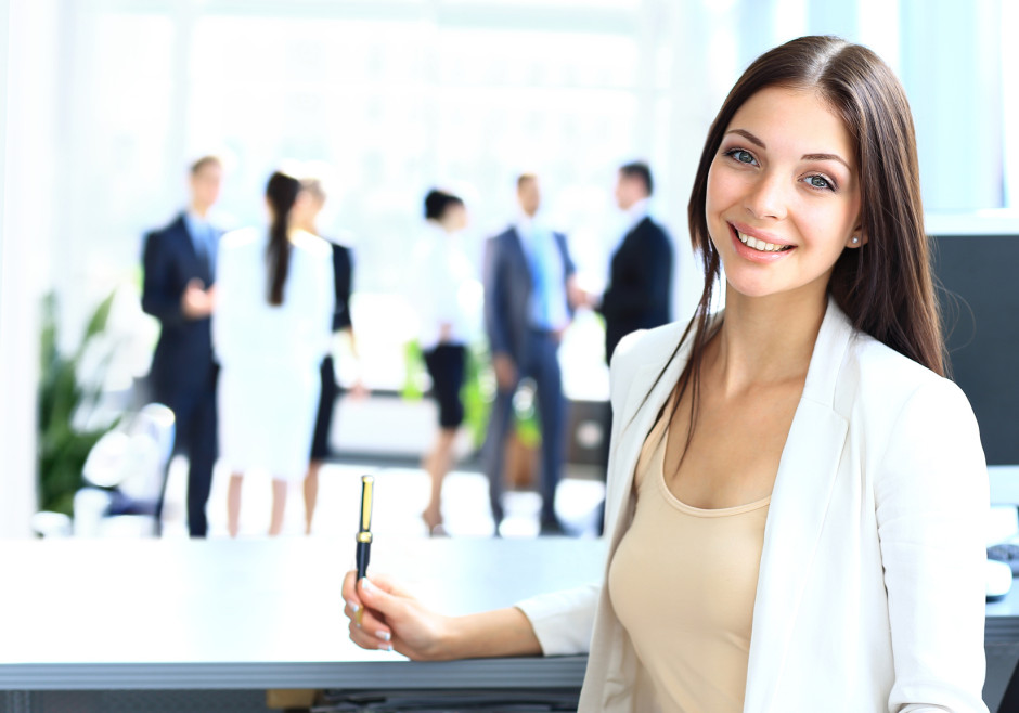 Young businesswoman and her colleagues